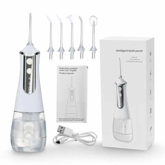 A white portable water flosser with all its components. USB cable, the different nozzles, instructions and box