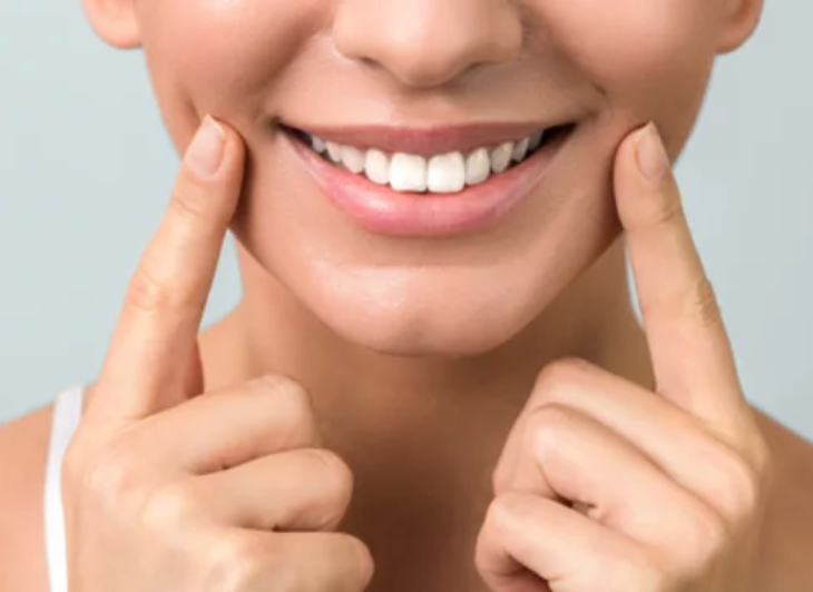 A young woman smiling
