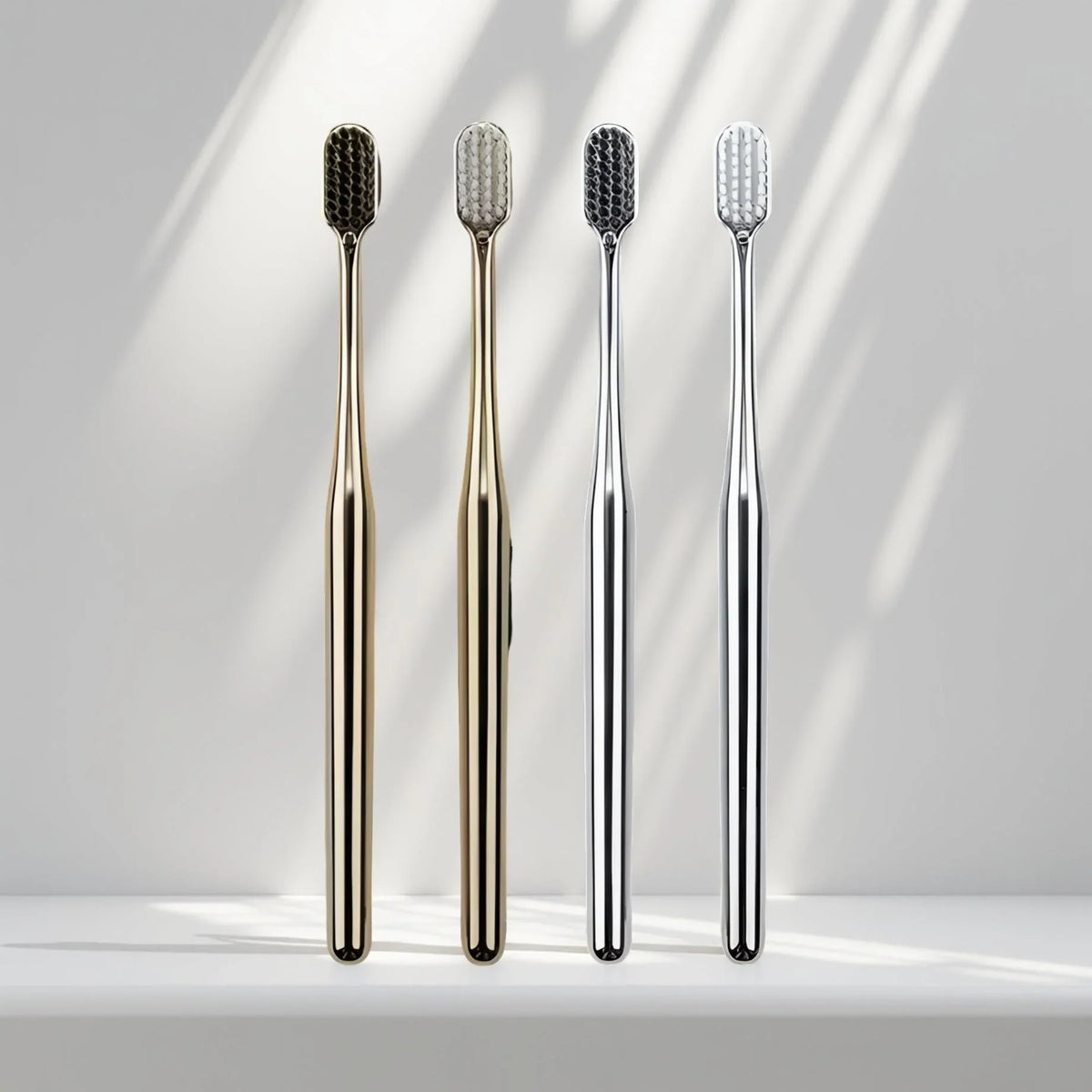 Four soft-bristle toothbrushes next to each other