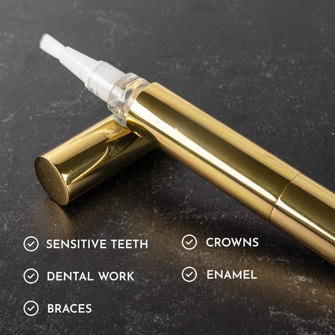 Whitening pen on a dark surface with text indicating its uses.