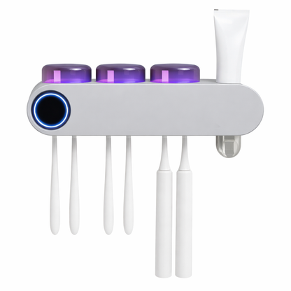 A grey Bathroom Organizer that uses Ultraviolet light to kill bacteria and dispenses toothpaste